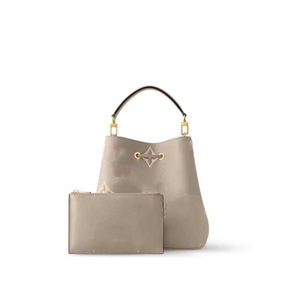 designer bag neonoe champagne bucket champagne bag gold metal ornament drawstring closed with adjustable strap for snaps
designer bag neonoe champagne bucket champagne bag gold metal ornament drawstring closed with adjustable strap for snaps