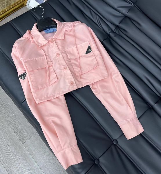 2023 summer womens tracksuits designer metal triangle long sleeves hooded sets charge jacket plus shorts women's print running suit t-s, White
2023 summer womens tracksuits designer metal triangle long sleeves hooded sets charge jacket plus shorts women's print running suit t-s, White