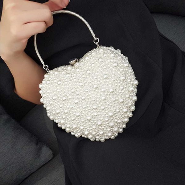 evening bags heart women creative handmade pearl lock weaving packet bridal over shoulder designer handbag 230427
evening bags heart women creative handmade pearl lock weaving packet bridal over shoulder designer handbag 230427