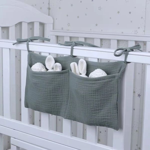 european and american double layer pure cotton baby bedside storage bag double pockets baby stroller hanging bag, printed baby bottle hangin
european and american double layer pure cotton baby bedside storage bag double pockets baby stroller hanging bag, printed baby bottle hangin
