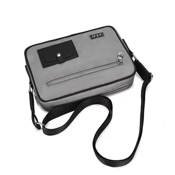 factory direct men's one-shoulder cross-body briefcase outside a decorative camera bag
factory direct men's one-shoulder cross-body briefcase outside a decorative camera bag