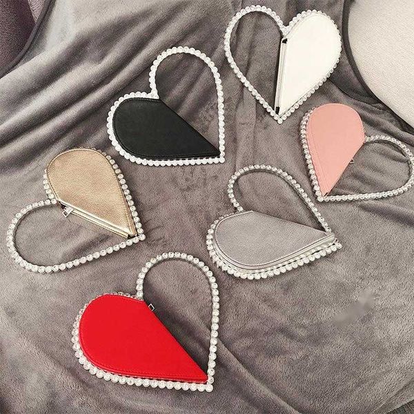 evening bags handbags for women 2023 designer luxury heart shaped diamond clutch metal handle banquet hand bag 230427
evening bags handbags for women 2023 designer luxury heart shaped diamond clutch metal handle banquet hand bag 230427