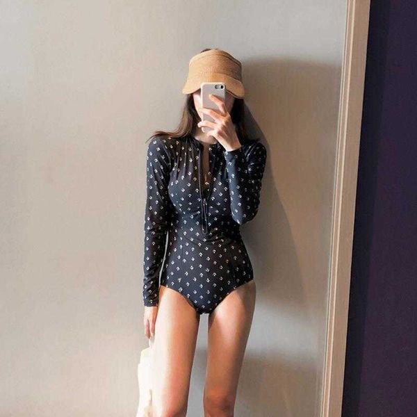 swimsuit womens conservative siamese cover belly thin push up student swimwear sports spring long sleeve, White;black
swimsuit womens conservative siamese cover belly thin push up student swimwear sports spring long sleeve, White;black