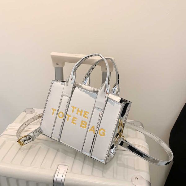 2023 handbag spring/summer new fashion handheld mini tote with glossy lacquer leather letter one shoulder crossbody bag
2023 handbag spring/summer new fashion handheld mini tote with glossy lacquer leather letter one shoulder crossbody bag