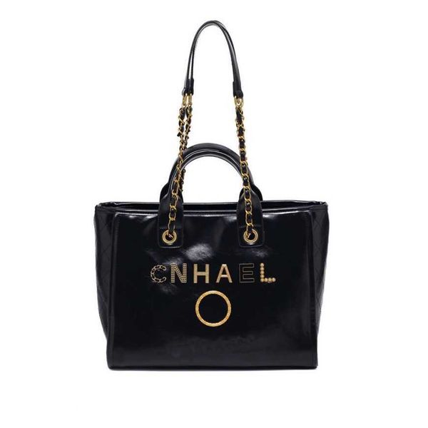 luxury classic handbags beach bags brand metal badge tote bag small evening handbag female capacity large leather one shoulder backpack fact
luxury classic handbags beach bags brand metal badge tote bag small evening handbag female capacity large leather one shoulder backpack fact