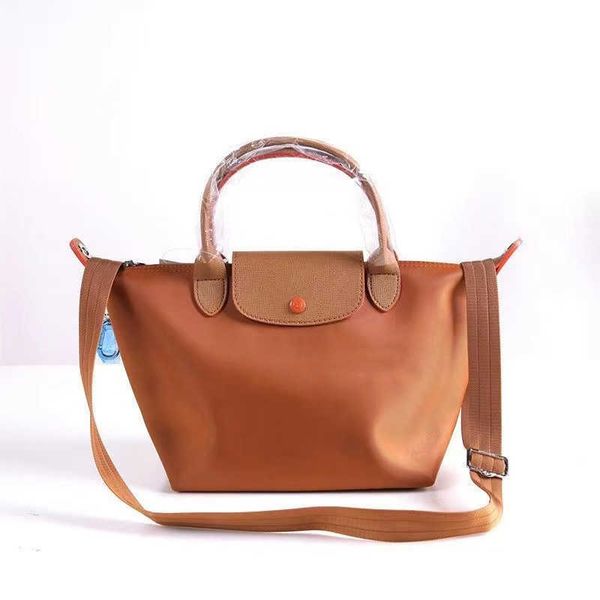 designer bag new embroidered crossbody handbag thickened nylon women's tote bag contrast color anniversary commemorative mini small sho
designer bag new embroidered crossbody handbag thickened nylon women's tote bag contrast color anniversary commemorative mini small sho