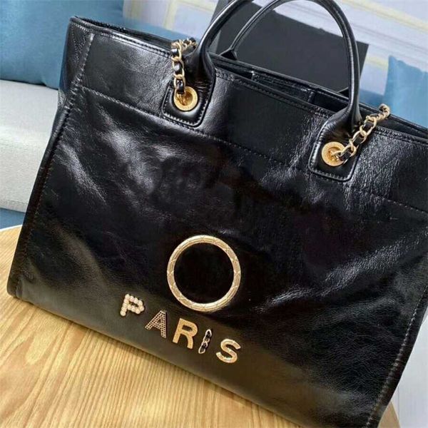 luxury classic handbags beach bags brand metal badge tote bag small evening handbag female capacity large leather one shoulder backpack fact
luxury classic handbags beach bags brand metal badge tote bag small evening handbag female capacity large leather one shoulder backpack fact