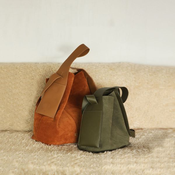 the medium hanging ear tote bag is slouchy and lightly carried on the commuter shoulder cross-body bag
the medium hanging ear tote bag is slouchy and lightly carried on the commuter shoulder cross-body bag