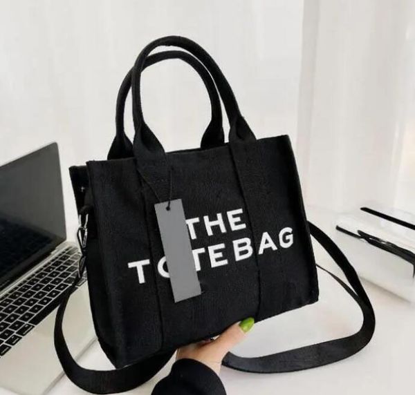 2023 marc the tote bag famous designer cool practical large capacity shoulder handbag women great coin purse crossbody casual square canvas, Black;red
2023 marc the tote bag famous designer cool practical large capacity shoulder handbag women great coin purse crossbody casual square canvas, Black;red