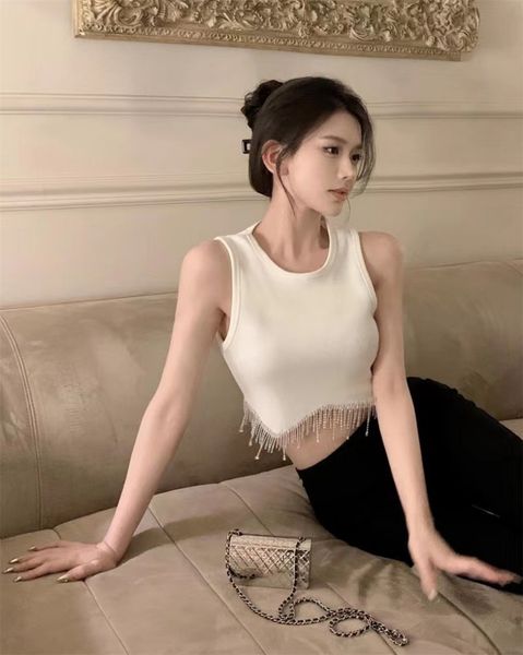white t-shirt heavy tassel suspender vest women's summer high-quality temperament high waist slimming i-word inside take short style ou
white t-shirt heavy tassel suspender vest women's summer high-quality temperament high waist slimming i-word inside take short style ou