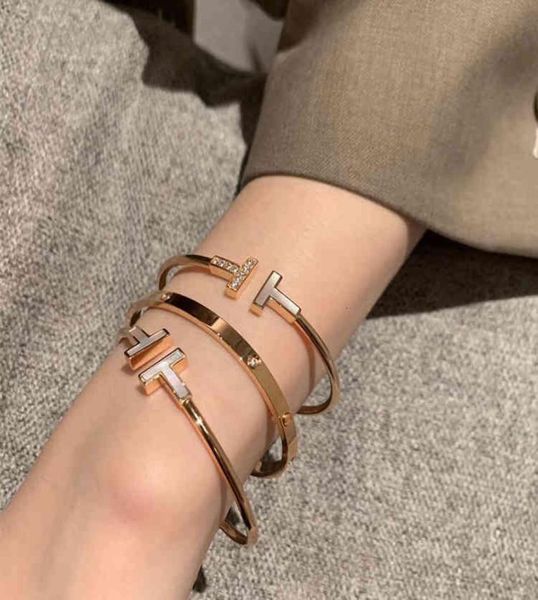 er lifan korean fashion white mother shell diamond inlaid double t bracelet open tshaped titanium steel plated 18k rose gold1386337, Black
er lifan korean fashion white mother shell diamond inlaid double t bracelet open tshaped titanium steel plated 18k rose gold1386337, Black