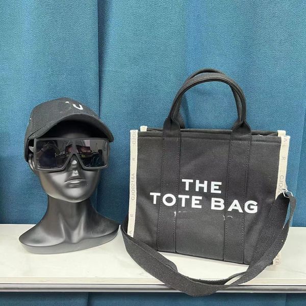 the new style beach bag crossbody marc the tote luxury handbag womens mens designer cowboy pochette burlon shoulder bags canvas clutch r0506
the new style beach bag crossbody marc the tote luxury handbag womens mens designer cowboy pochette burlon shoulder bags canvas clutch r0506