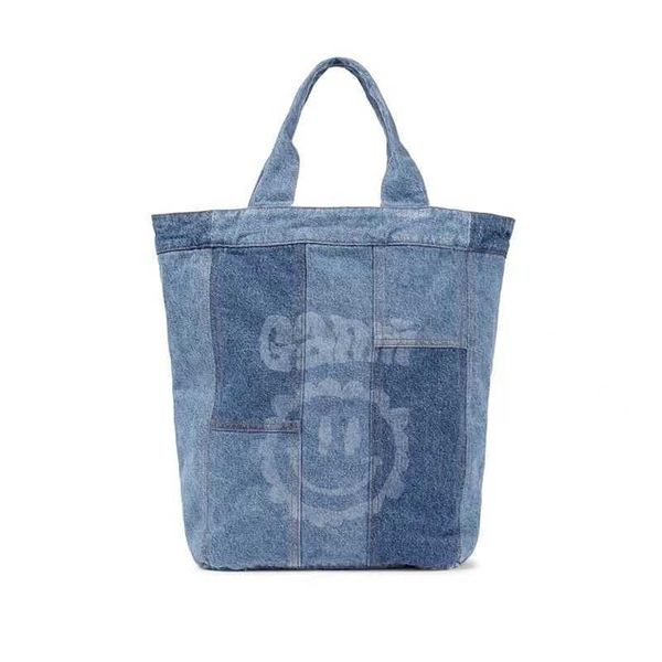 designer bag minority ganni smiling face printed cowboy tote bag women's summer large bag one shoulder portable large capacity bag
designer bag minority ganni smiling face printed cowboy tote bag women's summer large bag one shoulder portable large capacity bag