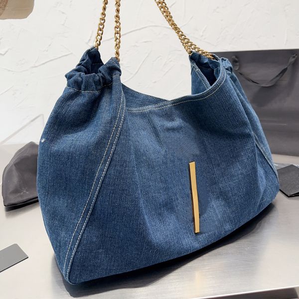 denim shopping tote bag fashion shoulder bags large capacity women travel handbags gold metal chian big letter hardware interior zipper pock
denim shopping tote bag fashion shoulder bags large capacity women travel handbags gold metal chian big letter hardware interior zipper pock