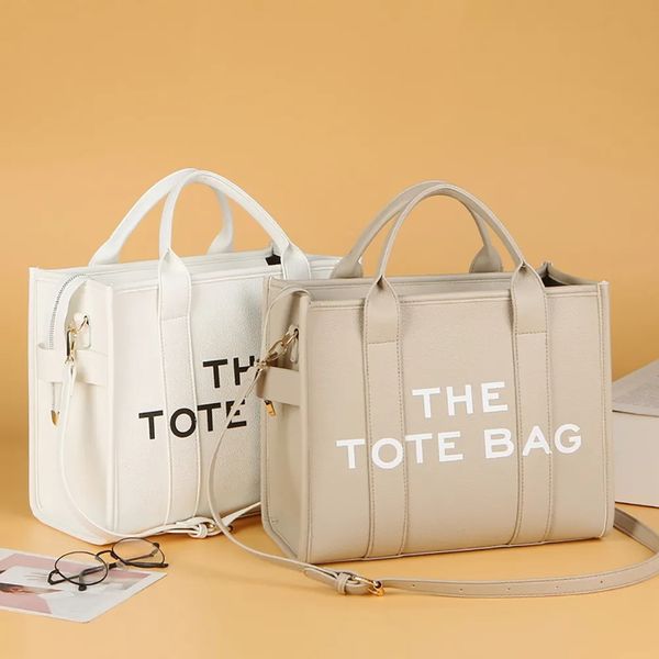 the tote bag women's bag new printed letter pu leather designer handbag luxury shoulder crossbody bags shopping bag
the tote bag women's bag new printed letter pu leather designer handbag luxury shoulder crossbody bags shopping bag