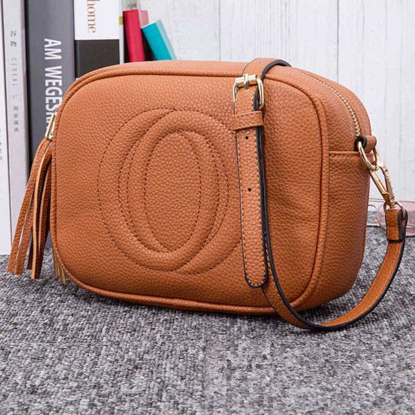 purse new fashion same mini one shoulder messenger tassel camera women's bag magnetic buckle small square, Red;black
purse new fashion same mini one shoulder messenger tassel camera women's bag magnetic buckle small square, Red;black