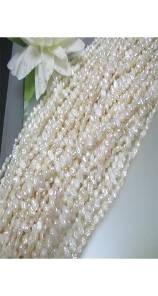 3 strands vintage freshwater biwa pearl white side drilled flat oval loose pearl 34mm t2005079415099
3 strands vintage freshwater biwa pearl white side drilled flat oval loose pearl 34mm t2005079415099