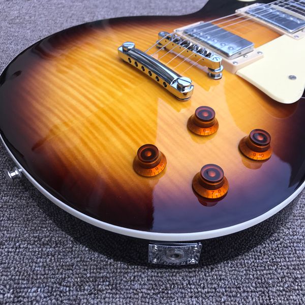 mahogany fingerboard electric guitar, dark sun burst maple flame solid mahogany body, chrome hardware, 5
mahogany fingerboard electric guitar, dark sun burst maple flame solid mahogany body, chrome hardware, 5