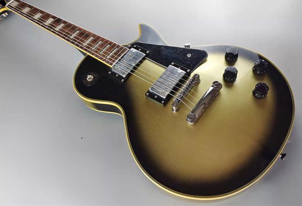 custom electric guitar, yellow logo, 60s, vintage silver and silver accessories, mahogany body,258
custom electric guitar, yellow logo, 60s, vintage silver and silver accessories, mahogany body,258