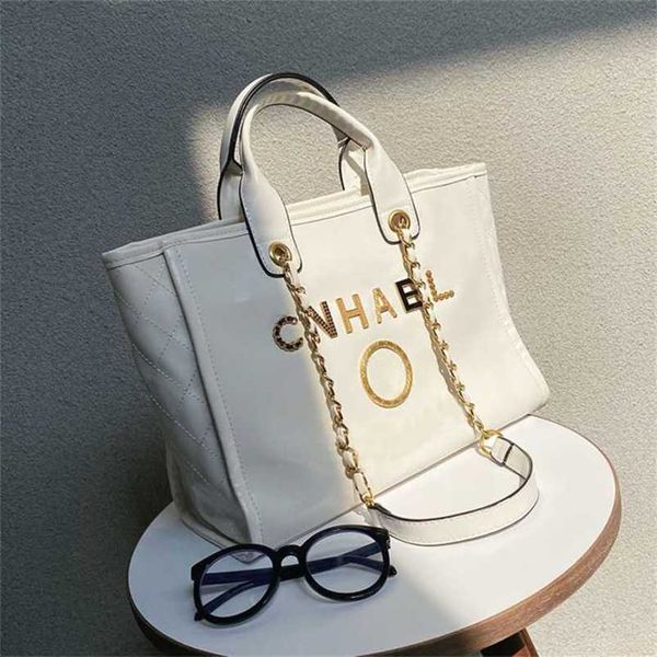 classic luxury handbags beach bags brand metal badge tote bag small evening handbag female capacity large leather one shoulder backpack fact
classic luxury handbags beach bags brand metal badge tote bag small evening handbag female capacity large leather one shoulder backpack fact