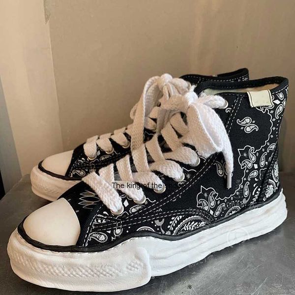 co branded mmy dissolving maison mihara yasuhiro cashew flower thick soled men's board shoes women's high rise low black deformati
co branded mmy dissolving maison mihara yasuhiro cashew flower thick soled men's board shoes women's high rise low black deformati