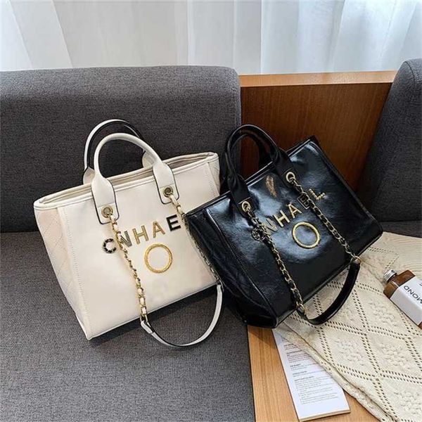 luxury fashion handbags beach bags brand metal badge tote bag small evening handbag female capacity large leather one shoulder backpack fact
luxury fashion handbags beach bags brand metal badge tote bag small evening handbag female capacity large leather one shoulder backpack fact