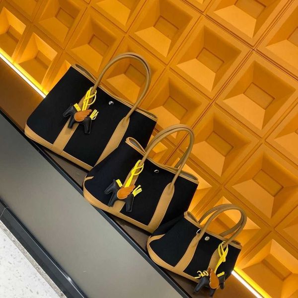 garden party bag totes 7a genuine canvas splicing 2023 canvas cowhide women's handbag capacity genuine leather shoulderqq with
garden party bag totes 7a genuine canvas splicing 2023 canvas cowhide women's handbag capacity genuine leather shoulderqq with