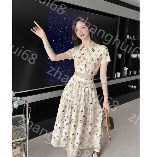 23ss skirt set women designer clothes brand spring summer new camo logo printed lapel short-sleeved shirt slimming long half skirt suit wome, White
23ss skirt set women designer clothes brand spring summer new camo logo printed lapel short-sleeved shirt slimming long half skirt suit wome, White
