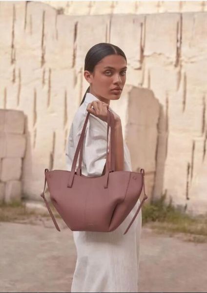 new polene cyme tote bag full-grain textured leather designer magnetic buckle closure handbag women suede inner lining luxury large capacity
new polene cyme tote bag full-grain textured leather designer magnetic buckle closure handbag women suede inner lining luxury large capacity