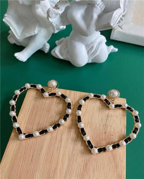 803 vintage stick metal baroque imitation pearl love woven exaggerated earrings and earrings1953235, Golden
803 vintage stick metal baroque imitation pearl love woven exaggerated earrings and earrings1953235, Golden