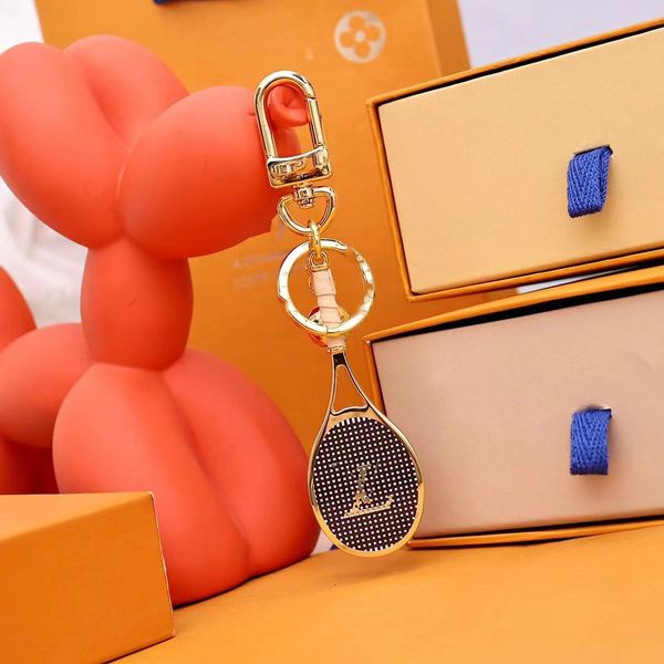 designer's new racquet decorative keychain this design features letters engraved on the racket net to showcase a unique style, Silver
designer's new racquet decorative keychain this design features letters engraved on the racket net to showcase a unique style, Silver