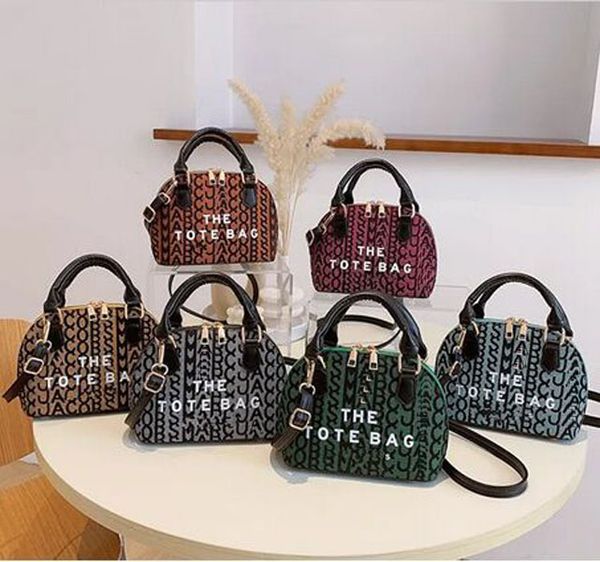 shopping bags the tote shell mini bag womens handbag designer purse wallet canvas alma bb crossbody clutch with shoulder strap hobo hand bag
shopping bags the tote shell mini bag womens handbag designer purse wallet canvas alma bb crossbody clutch with shoulder strap hobo hand bag