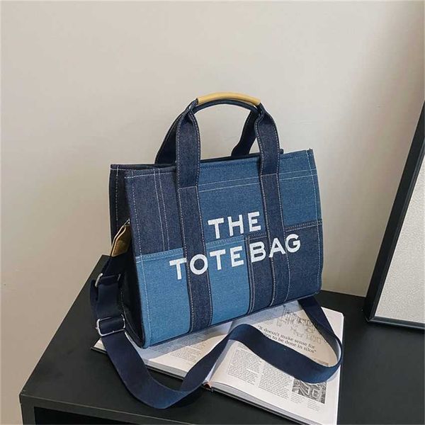 20% off 2023 fashion hand new denim color contrast splicing portable tote high-grade sense minority embroidered letter messenger bag
20% off 2023 fashion hand new denim color contrast splicing portable tote high-grade sense minority embroidered letter messenger bag