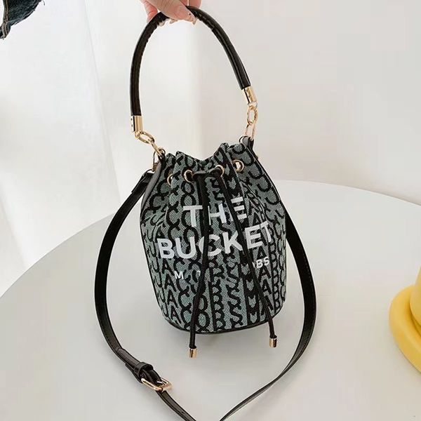 classic pull closure the marc canvas bucket bag womens men handbag original luxury tote drawstring shoulder fashion designer buckets the bag, Black;red
classic pull closure the marc canvas bucket bag womens men handbag original luxury tote drawstring shoulder fashion designer buckets the bag, Black;red