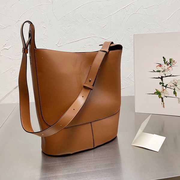 loe brown casual bucket handbag medium crossbody shoulder weekender bag calfskin leather adjustable shoulder strap 30cm
loe brown casual bucket handbag medium crossbody shoulder weekender bag calfskin leather adjustable shoulder strap 30cm
