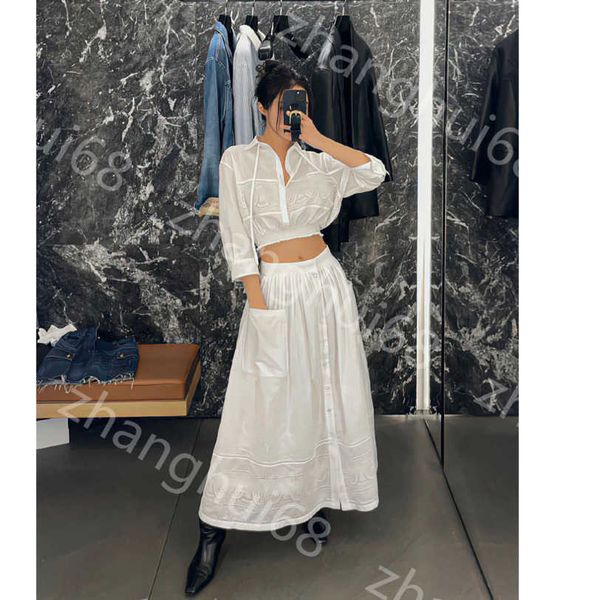 23ss women designer clothes skirt set lapel embroidery hollowed out long sleeve short shirt same series pocket half umbrella skirt long skir, White
23ss women designer clothes skirt set lapel embroidery hollowed out long sleeve short shirt same series pocket half umbrella skirt long skir, White