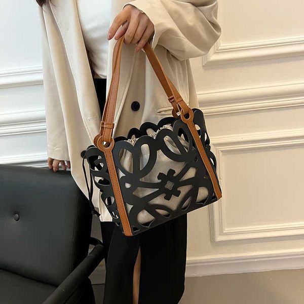 nxy hollow out pu leather shoulder side bag for women small tote bags y2k casual outside handbags and purses 230424
nxy hollow out pu leather shoulder side bag for women small tote bags y2k casual outside handbags and purses 230424