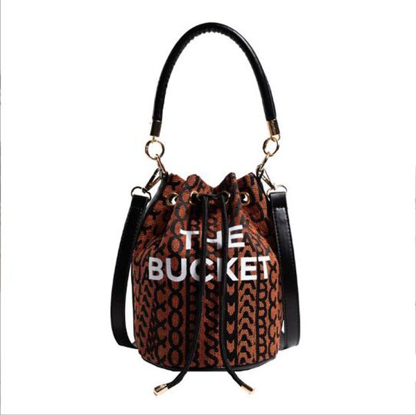 classic pull closure the marc leather bucket bag womens men handbag original luxury tote drawstring shoulder fashion designer buckets wallet, Red;black
classic pull closure the marc leather bucket bag womens men handbag original luxury tote drawstring shoulder fashion designer buckets wallet, Red;black