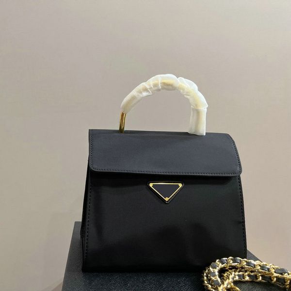 designer women's portable women's bag medieval waterproof nylon canvas oxford cloth metal ring handle portable clamshell small squ
designer women's portable women's bag medieval waterproof nylon canvas oxford cloth metal ring handle portable clamshell small squ