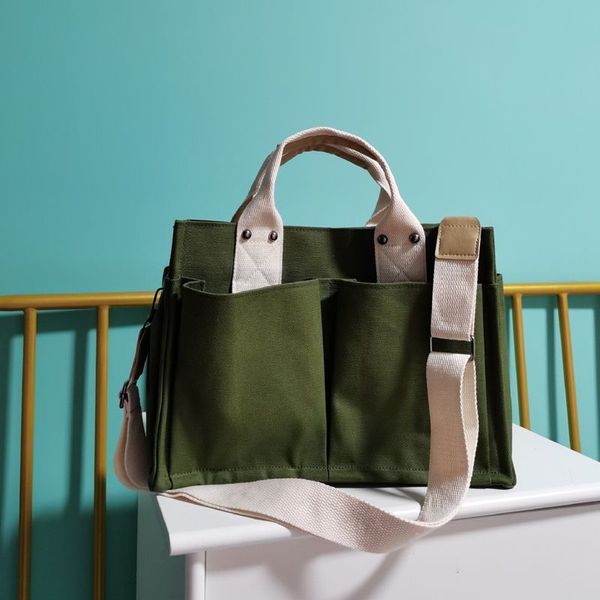 large capacity minimalist one-shoulder canvas bag with many pockets solid color tote bag for ladies
large capacity minimalist one-shoulder canvas bag with many pockets solid color tote bag for ladies