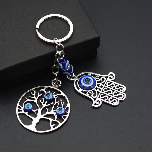 turkish evil eye keychains lucky blue eye tree charm key chain vintage keyring for men women car key pendant, Slivery;golden 
turkish evil eye keychains lucky blue eye tree charm key chain vintage keyring for men women car key pendant, Slivery;golden