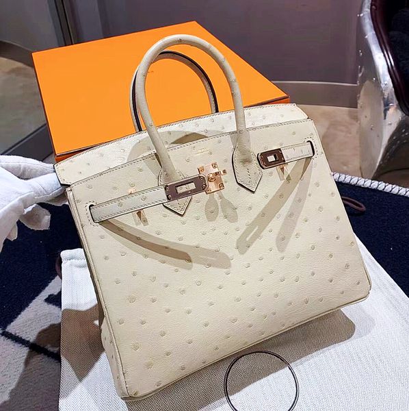 designer tote luxury hand bag classic wrist bag 25 30 size imported special genuine leather beeswax line fully handmade 22k plated original
designer tote luxury hand bag classic wrist bag 25 30 size imported special genuine leather beeswax line fully handmade 22k plated original