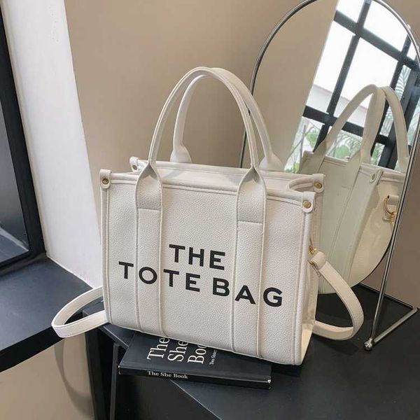 designer bags tote evening bags the tote bag small new women's bag ins trend fashion tote bag single shoulder messenger bagfbi1fbi1
designer bags tote evening bags the tote bag small new women's bag ins trend fashion tote bag single shoulder messenger bagfbi1fbi1