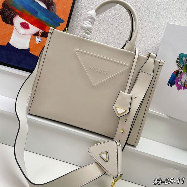 cow leather tote bag large capacity handbag plain shoulder bags fashion letter hardware detachable triangular small bag internal zipper pock
cow leather tote bag large capacity handbag plain shoulder bags fashion letter hardware detachable triangular small bag internal zipper pock