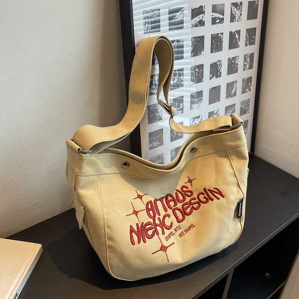 nxy big canvas letter design y2k shoulder side bag for women casual ladies handbags simple large capacity tote school book s 230424
nxy big canvas letter design y2k shoulder side bag for women casual ladies handbags simple large capacity tote school book s 230424