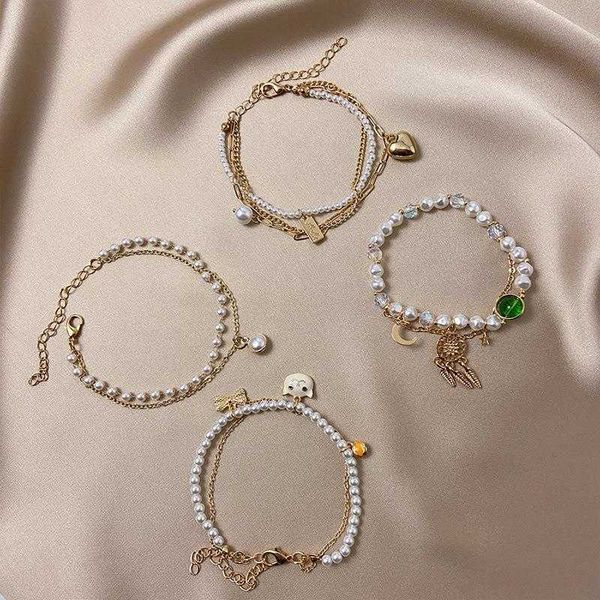 japanese and korean bracelets double layer pearl simplicity heart bracelet fresh dream catcher pendant artificial crystal, Golden;silver
japanese and korean bracelets double layer pearl simplicity heart bracelet fresh dream catcher pendant artificial crystal, Golden;silver