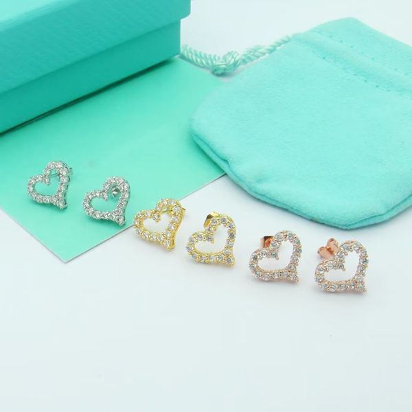 designer openwork heart full diamond stud earrings branded in 925 silver suitable as an engagement gift, Golden;silver
designer openwork heart full diamond stud earrings branded in 925 silver suitable as an engagement gift, Golden;silver