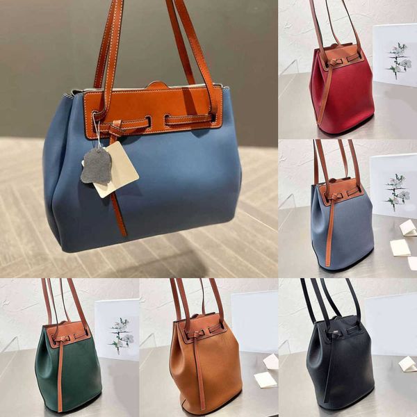 drawstring designer lychee drawstring bucket ladies handbag color matching handbags cowhide drawstring casual lady shopping purses 220804/09
drawstring designer lychee drawstring bucket ladies handbag color matching handbags cowhide drawstring casual lady shopping purses 220804/09