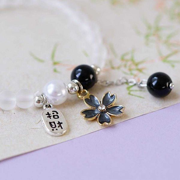 spring and summer japanese strand korean fashion crystal string beads cherry blossom bracelet simple artistic fortune, Black
spring and summer japanese strand korean fashion crystal string beads cherry blossom bracelet simple artistic fortune, Black