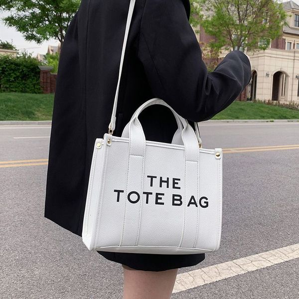 luxury the tote bag designer women mini large canvas leather marc crossbody shoulder handbags strap black pink totes bags handbag pvc totes, Black;red
luxury the tote bag designer women mini large canvas leather marc crossbody shoulder handbags strap black pink totes bags handbag pvc totes, Black;red